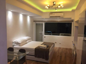 Cozy35sqm w parking balcony Wifi/Netflix near Mall